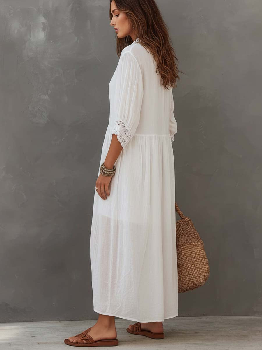 White lace-trim midi dress, side view with three-quarter sleeves and lace cuffs