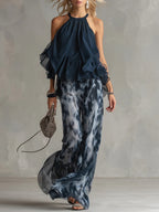 Navy chiffon halter-neck top with ruffled sleeves and printed wide-leg pants set
