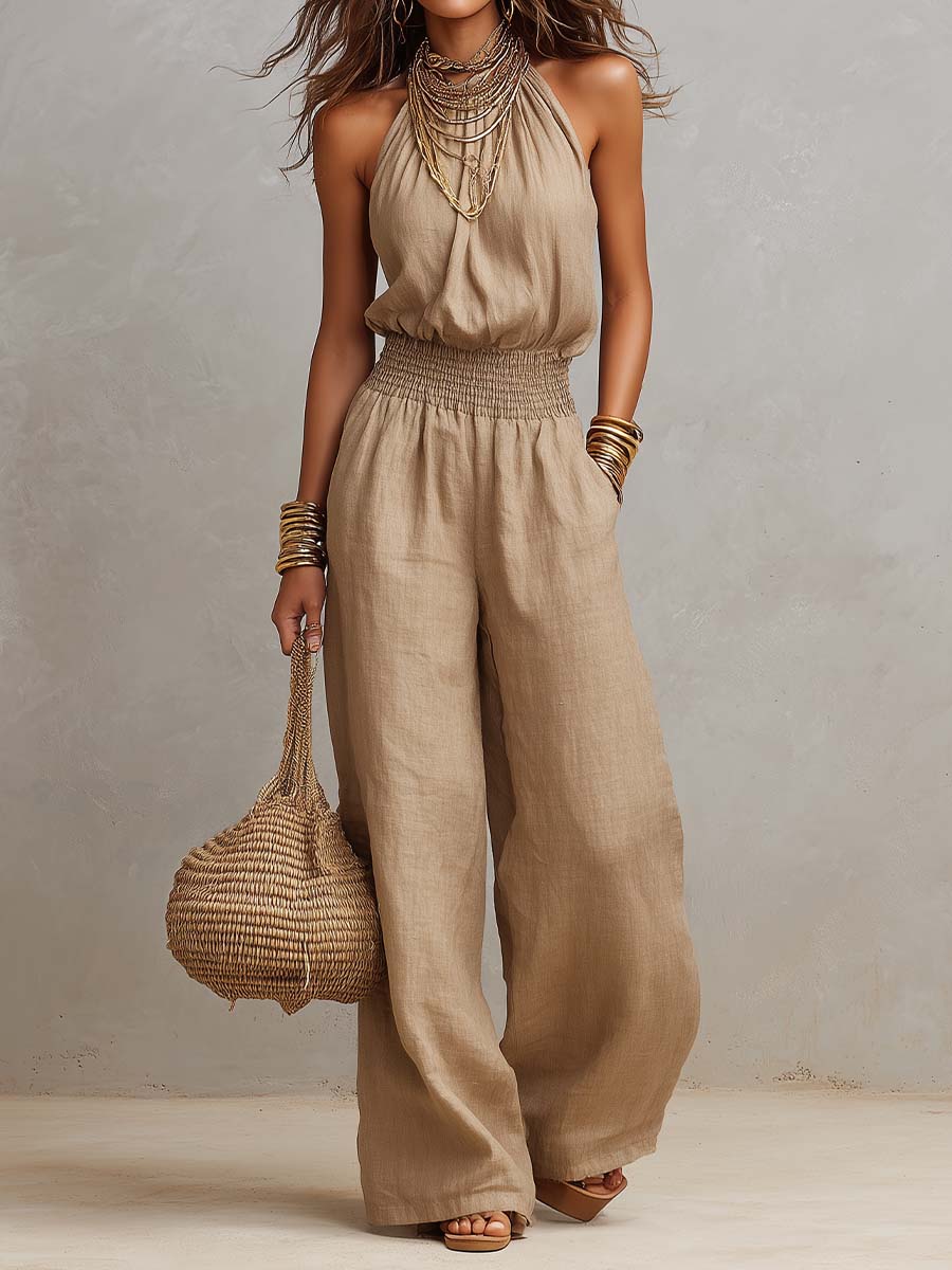 Beige linen-blend halter jumpsuit with smocked waist and wide-leg pants