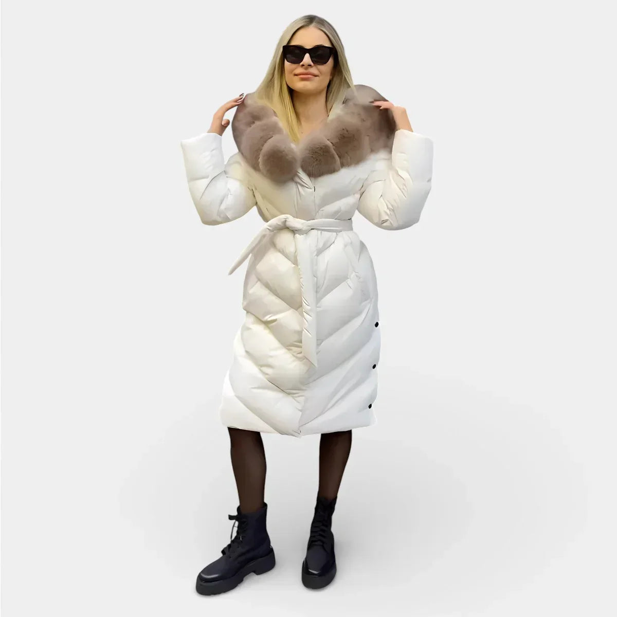 Long white puffer jacket with taupe fur hood, button front, and waist tie belt.