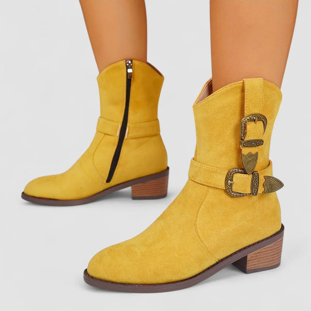 Yellow suede orthopedic western boots with side zipper and block heel.