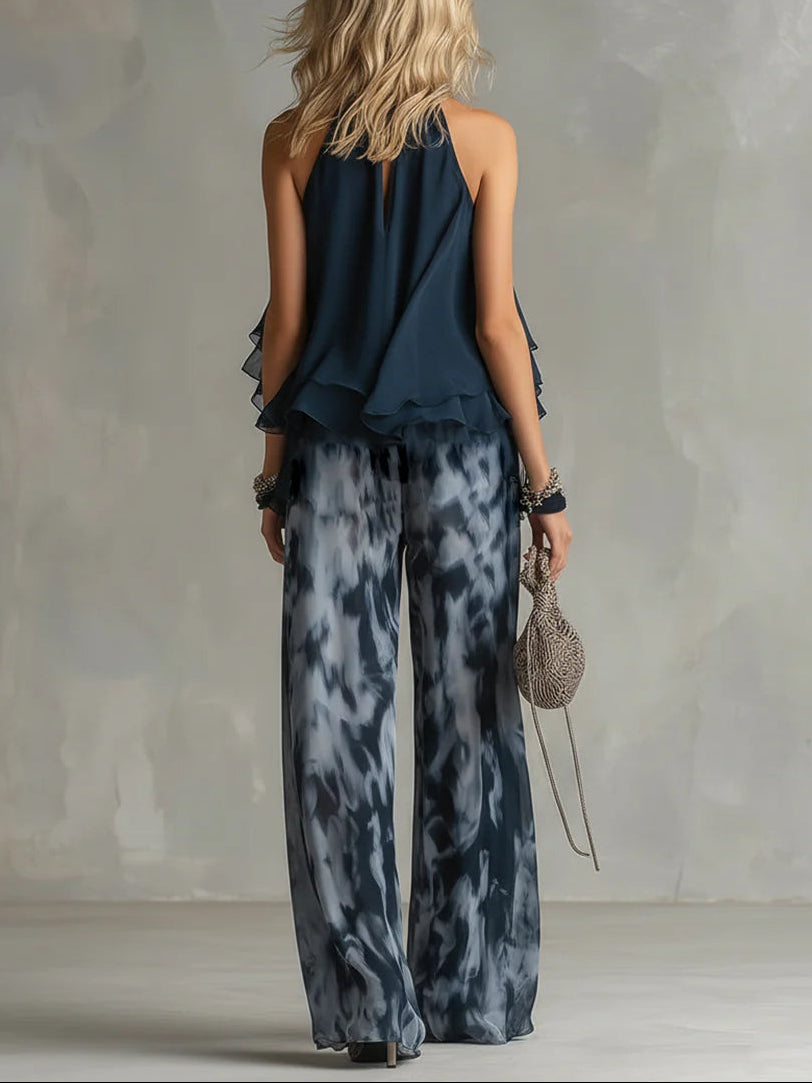 Navy chiffon halter-neck top and printed wide-leg pants set, back view