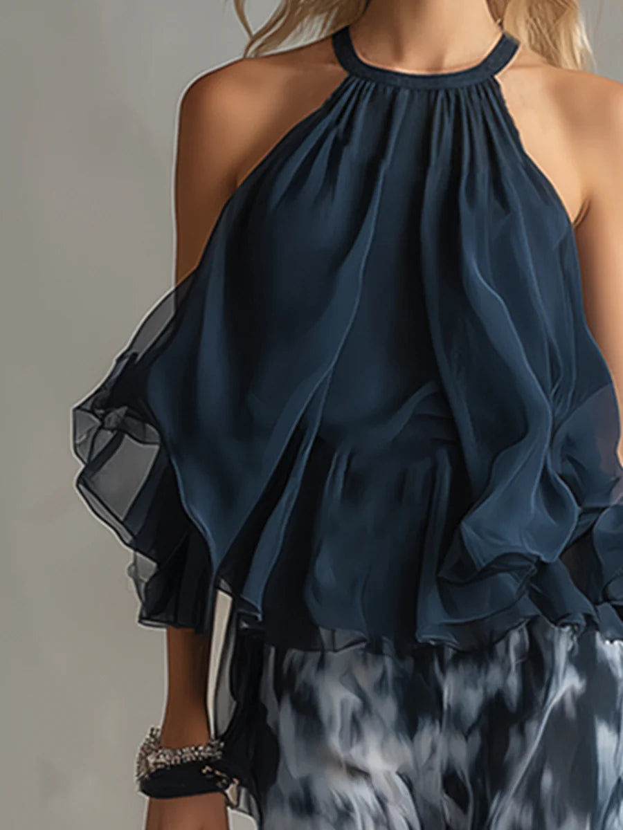 Navy chiffon halter-neck top with gathered neckline and layered ruffle hem