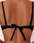 Black bikini set back view with adjustable straps and tie detail