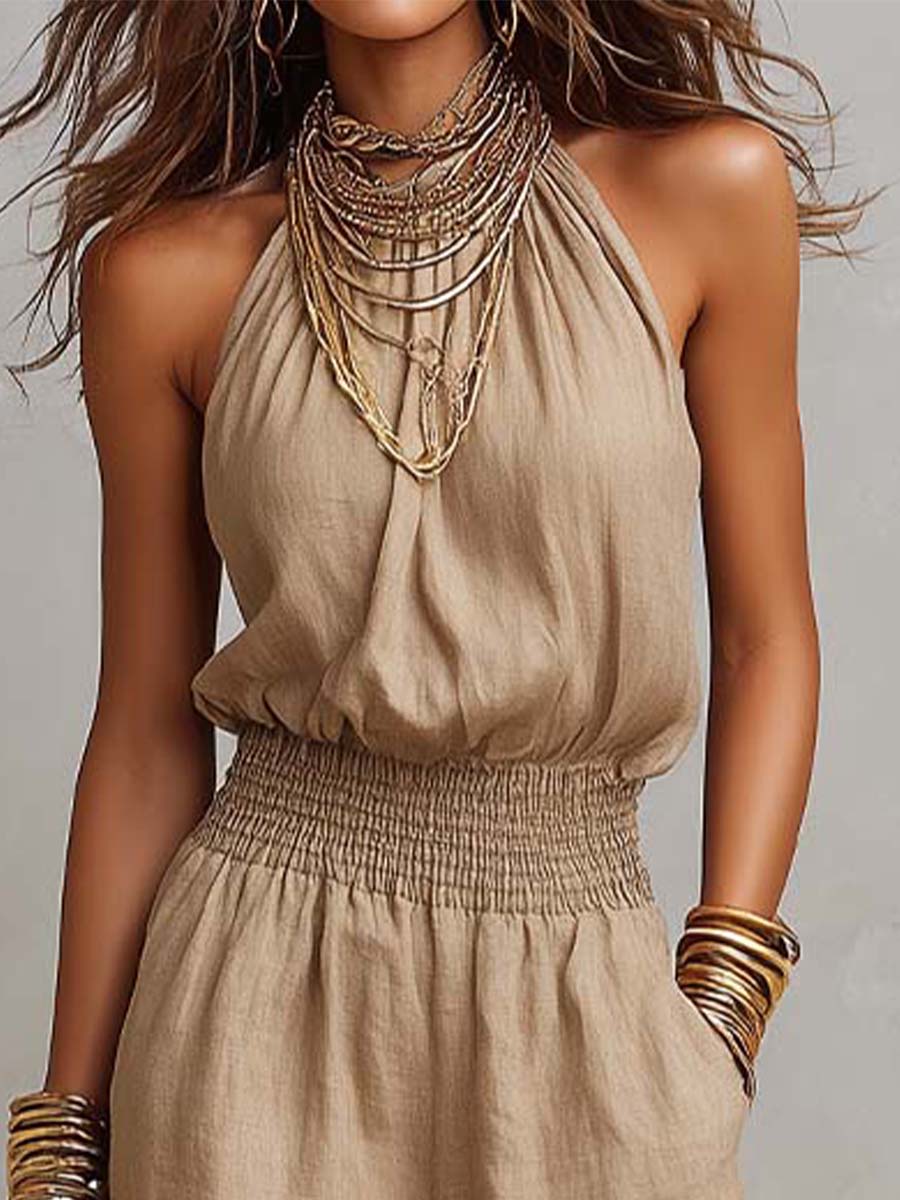 Beige halter jumpsuit with ruched neck, gathered waist, sleeveless wide-leg legs