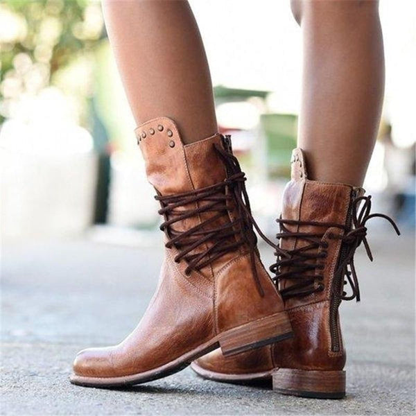 Brown vintage lace-up boots with studded ankle strap and low stacked heel