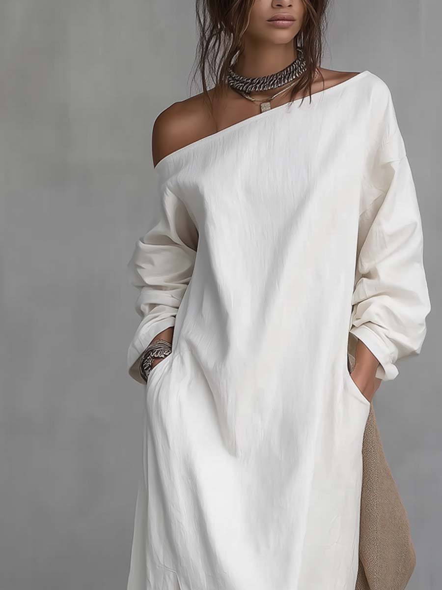 White one-shoulder loose midi dress with long puff sleeves and side slit