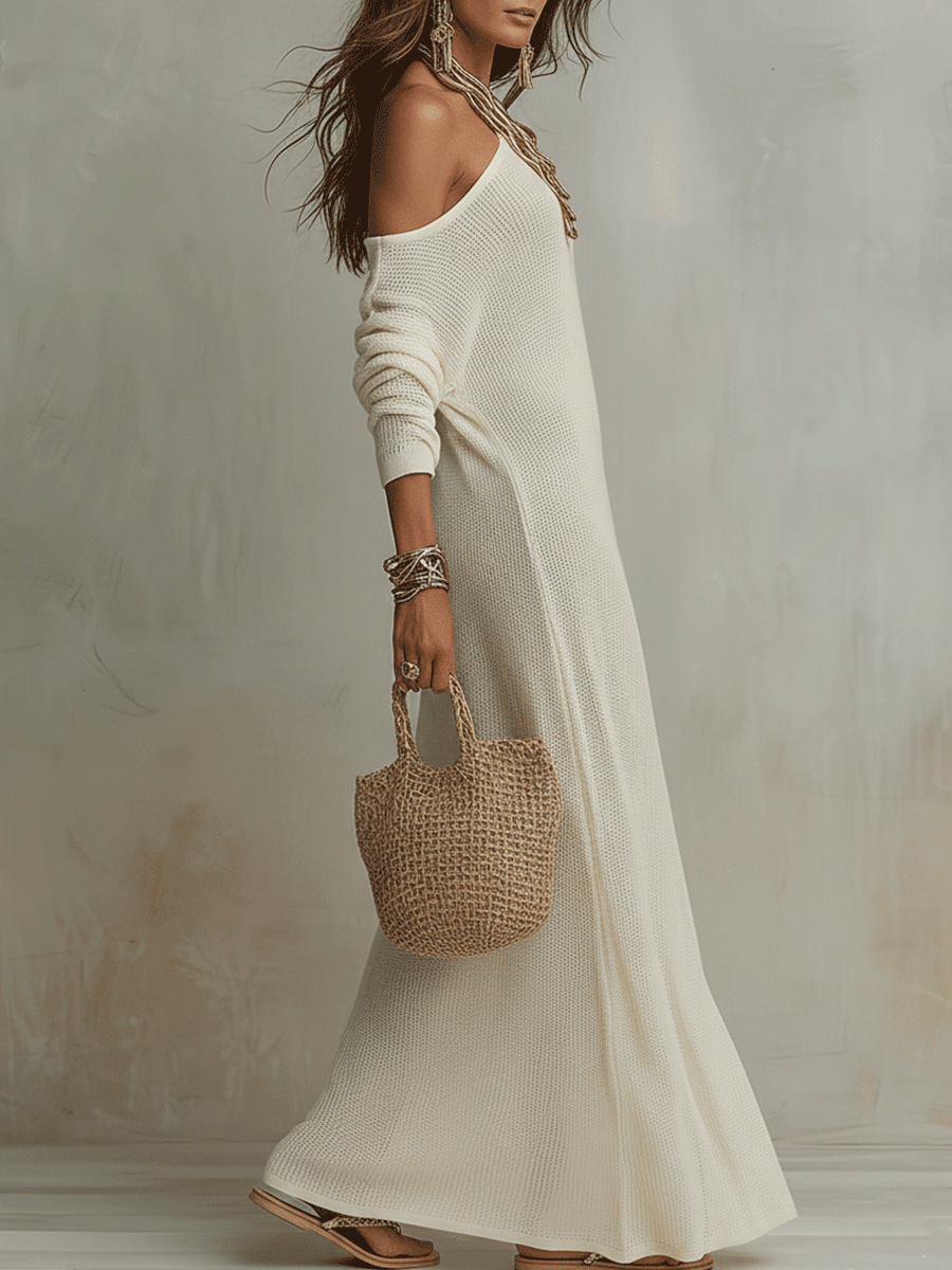 Soft ivory one-shoulder textured maxi dress with long sleeves and flowing hem