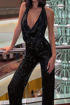 Black sequin halter party jumpsuit with deep V front and wide straight legs