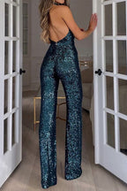 Teal-blue sequin halter party jumpsuit with backless style and wide legs