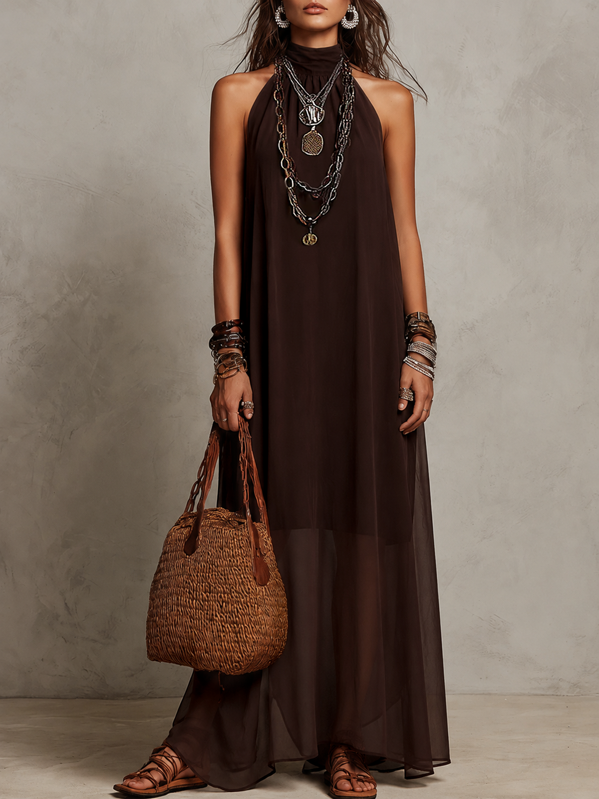 Dark brown halter neck long dress, sleeveless, flowing drape