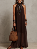 Dark brown halter neck long dress, sleeveless, flowing drape