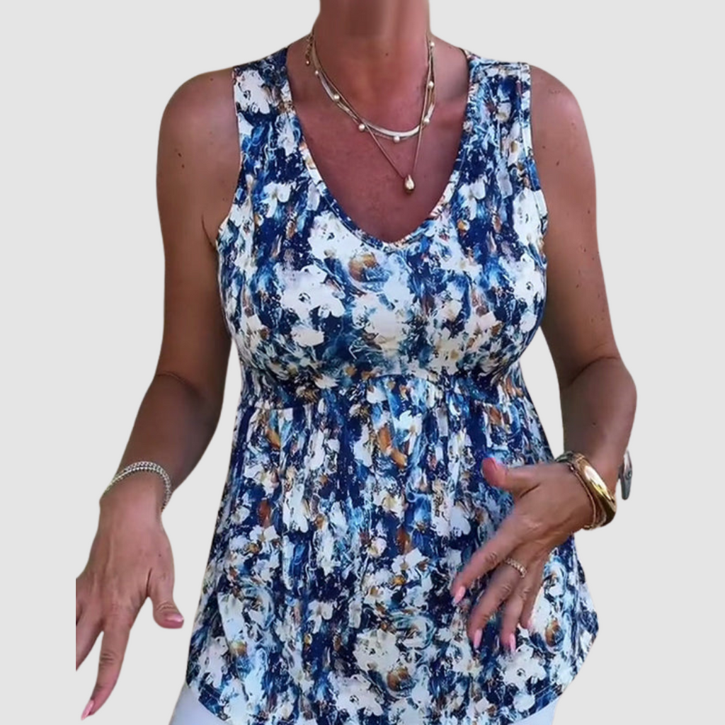 Soft breathable sleeveless top with blue-and-white abstract print, V-neck, gathered waist