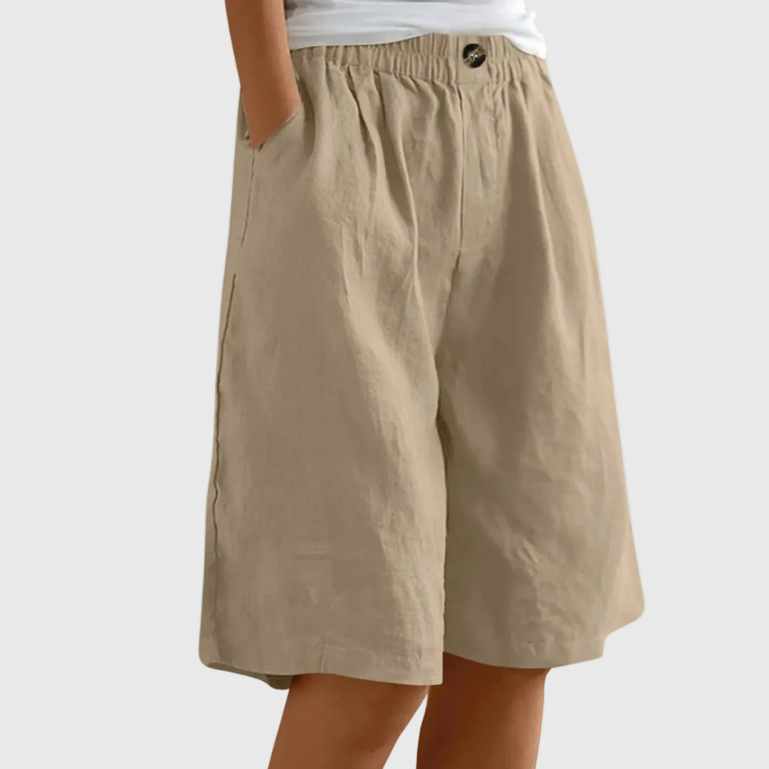 Loose-fit elastic waist shorts in camel brown with button detail at waistband