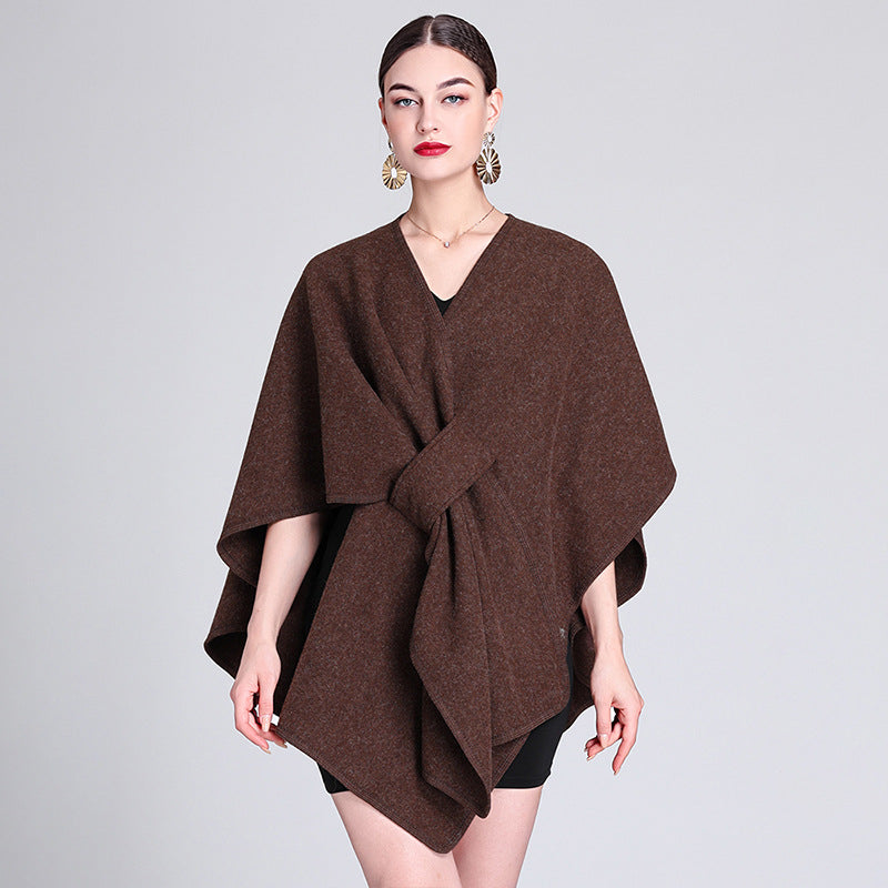 Dark brown caped fleece shawl with V-neck and waist tie, draped cape silhouette.