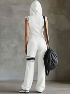 White hooded back view jumpsuit with striped cuff hem and lace shoulder trim