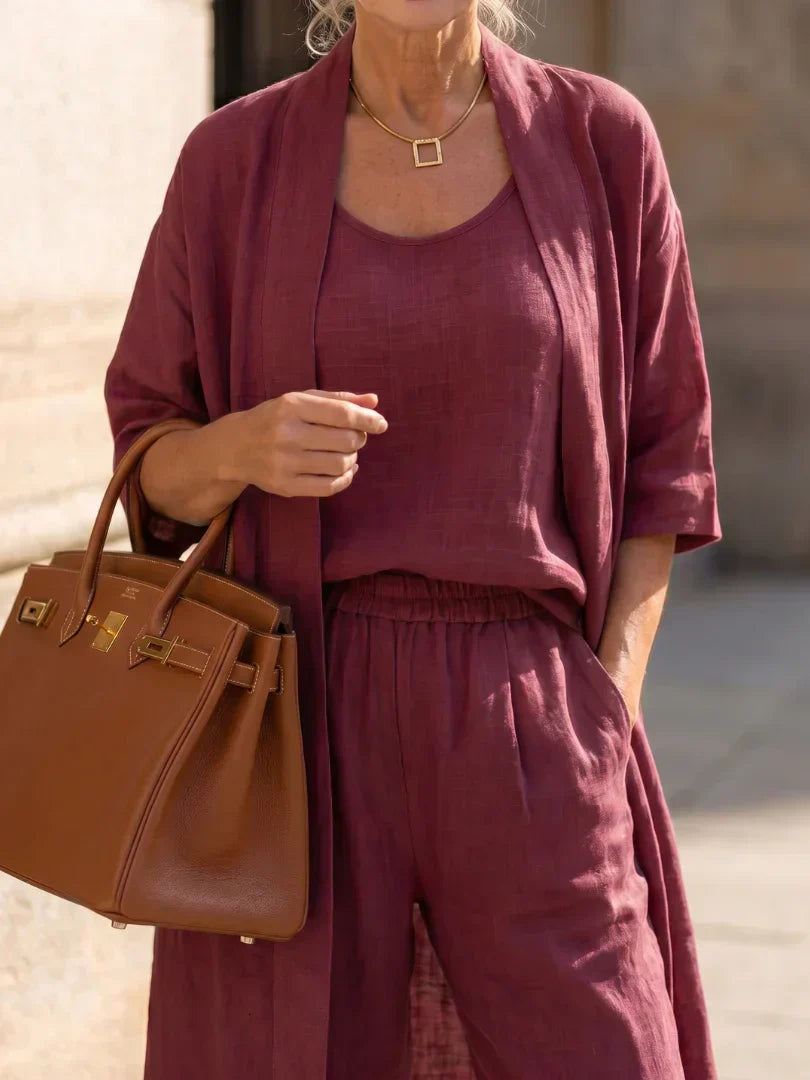 Women's burgundy linen-style set: scoop-neck top, wide-leg pants, and open-front cardigan