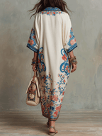 Ivory caftan midi dress, back view with blue and red floral paisley and wide sleeves