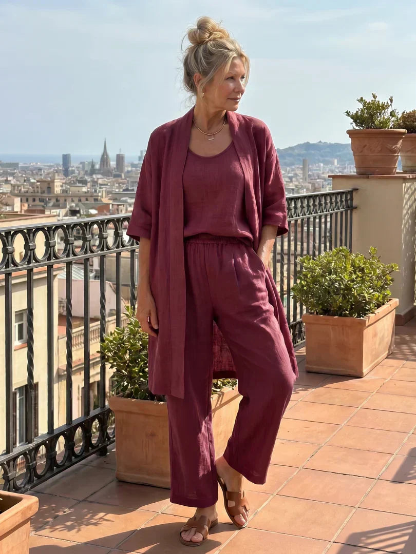 Women's burgundy linen-style set with draped kimono cardigan and wide-leg pants