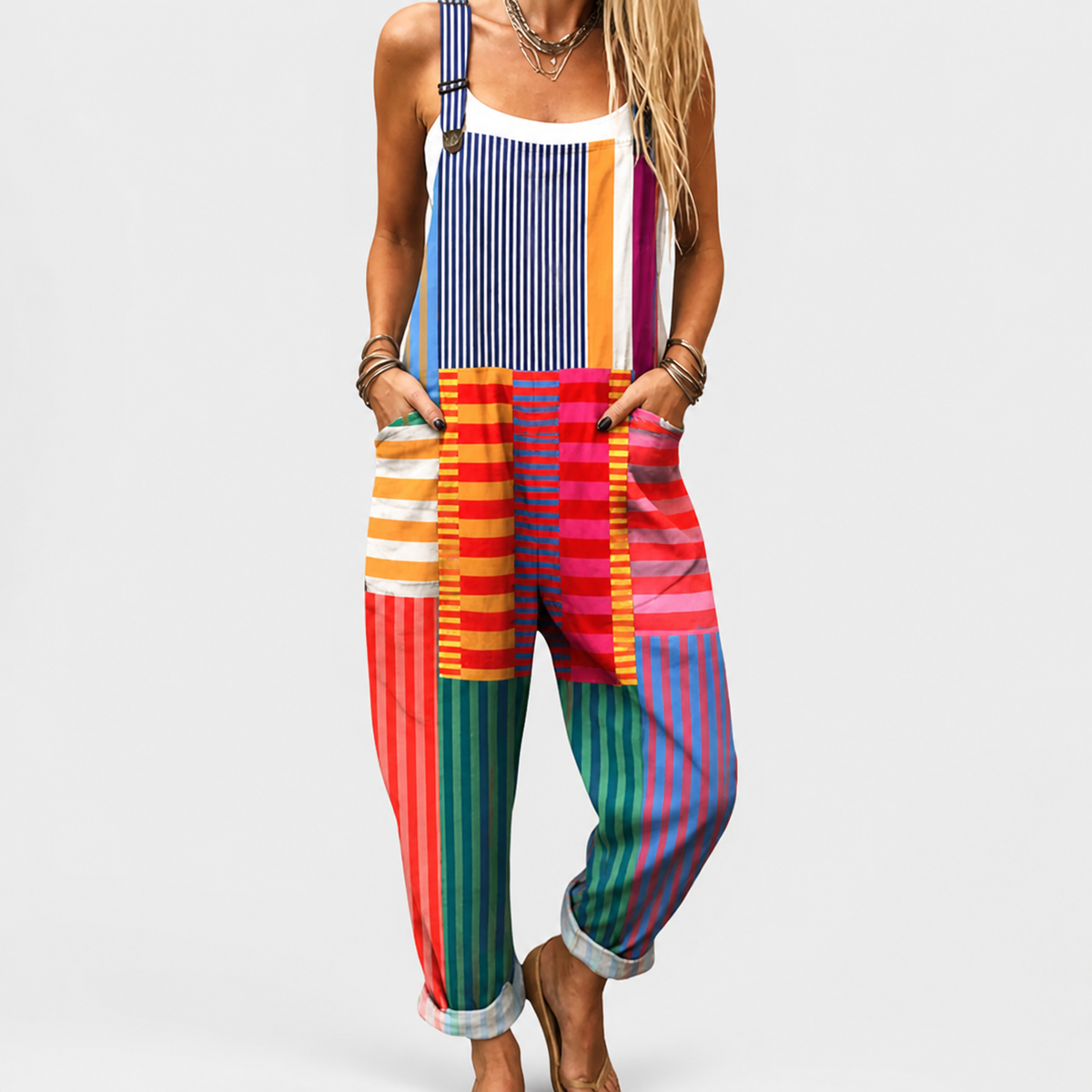 Multicolor printed jumpsuit with wide-leg striped pants and shoulder straps