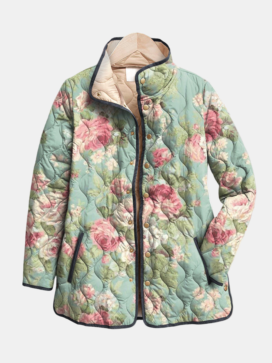 Quilted hooded floral jacket in mint blue with pink roses, dark trim, button front