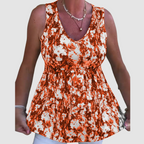 Natasha™ soft breathable sleeveless top, orange-and-white abstract print, V-neck
