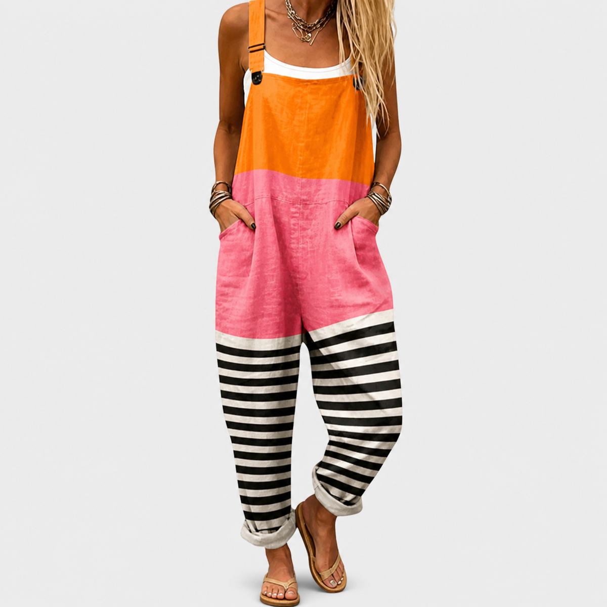 Color-block printed overalls with orange bib, pink body, and black-and-white striped legs