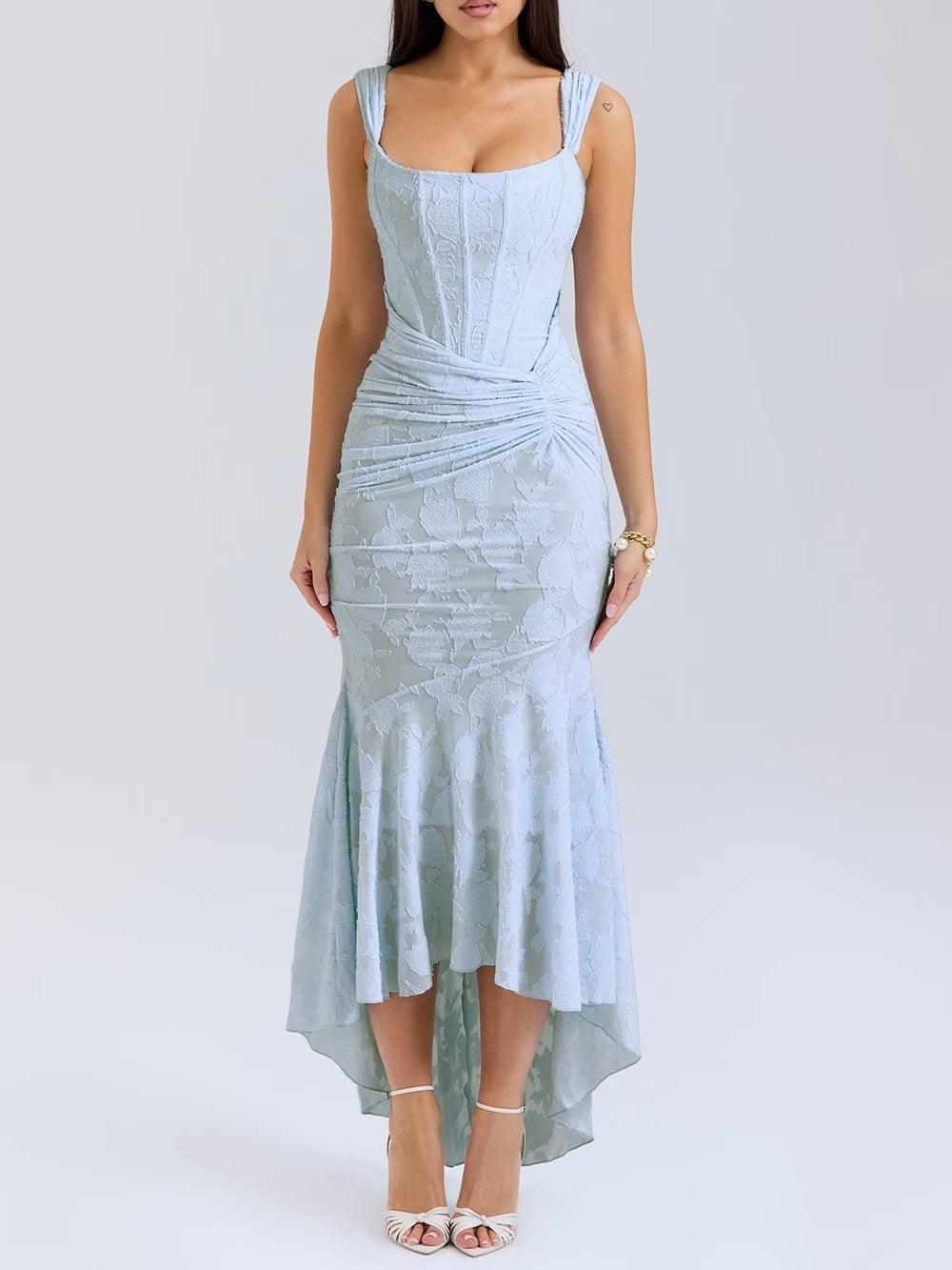 Blue floral maxi dress with white print, square neckline, ruching at waist, sleeveless.