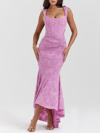 Pink floral maxi dress with scoop neckline, ruched waist and mermaid-style flared skirt