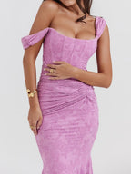 Pink floral maxi dress with off-shoulder puff sleeves, ruched waist and fitted skirt
