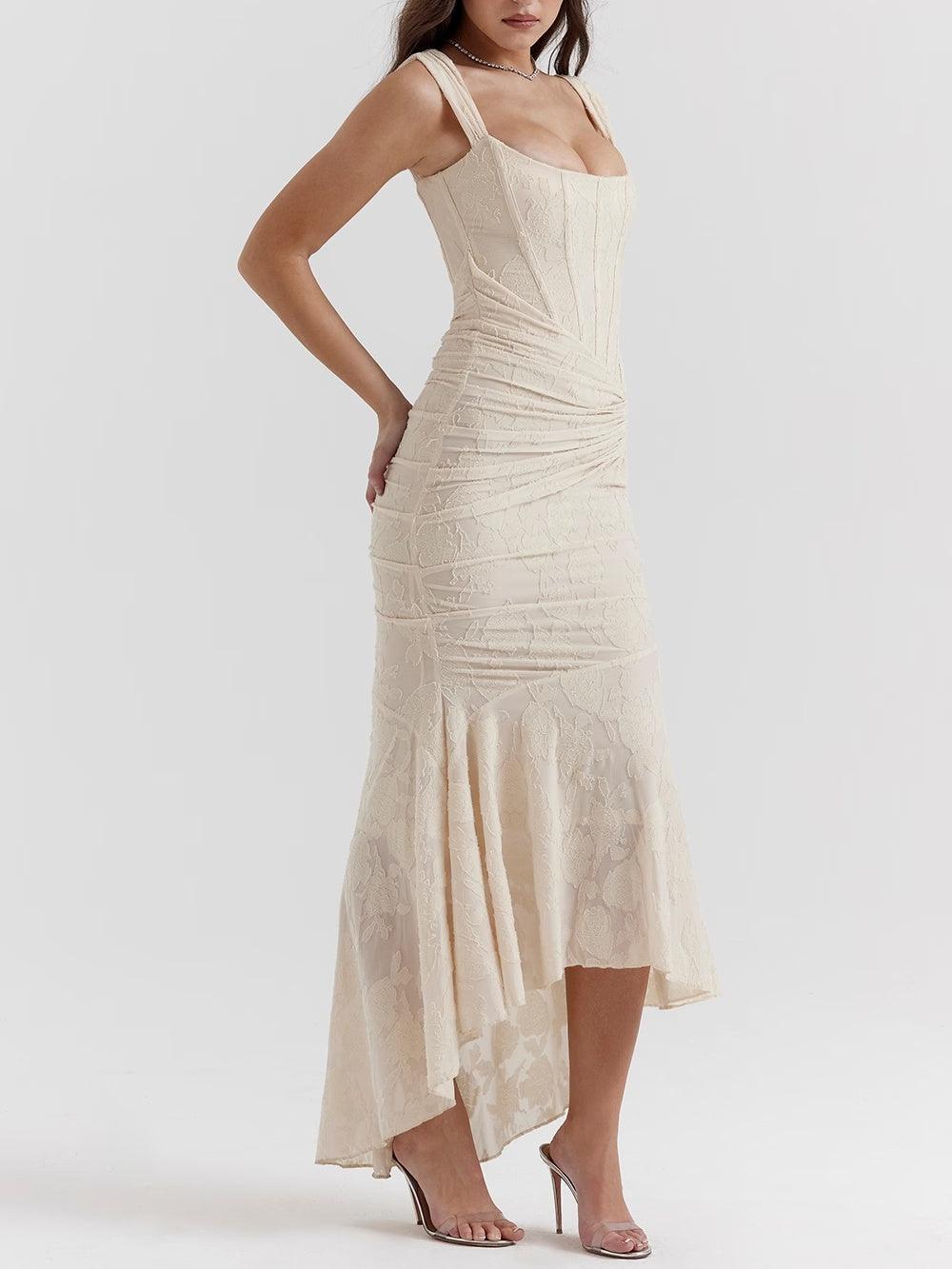 Cream sleeveless maxi dress with ruched bodice and flowing asymmetrical skirt