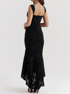 Black floral maxi dress with back scoop, sleeveless ruched design and flared hem