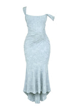 Light blue floral maxi dress with gathered bust, ruched waist, and asymmetrical hem.