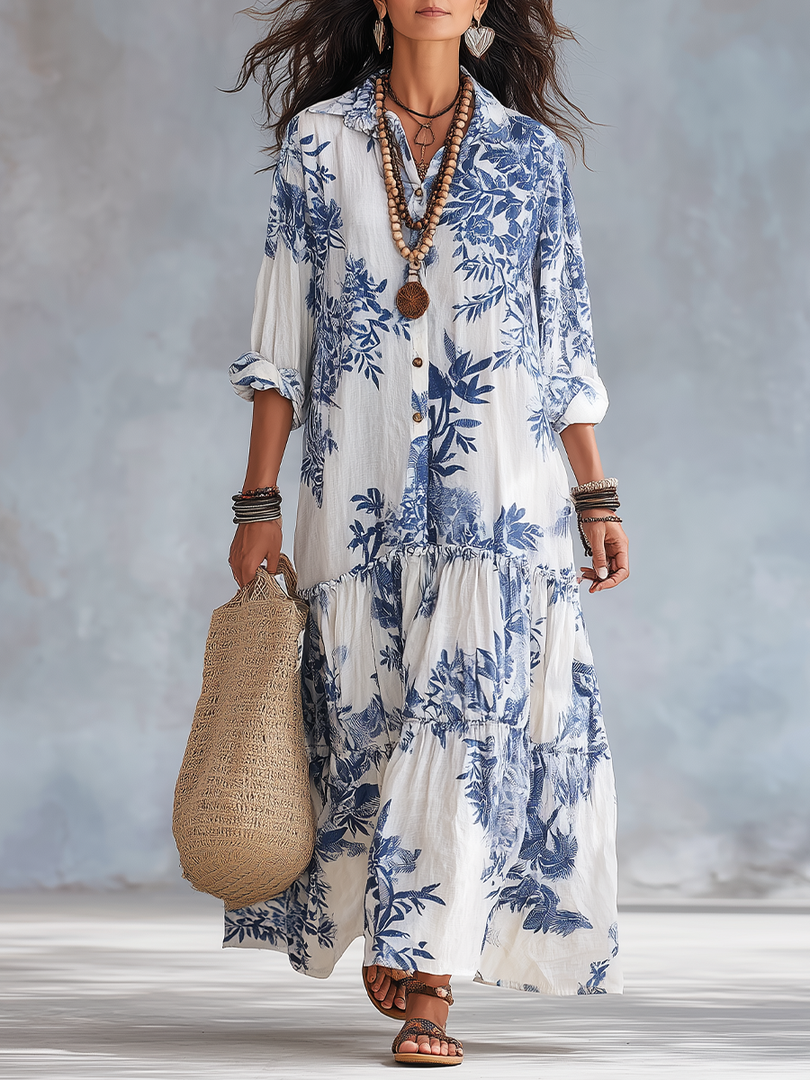 White and blue floral tiered button-front maxi dress with puff sleeves and ruffles