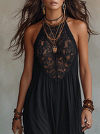 Black sleeveless maxi dress close-up with lace halter yoke and gathered bodice