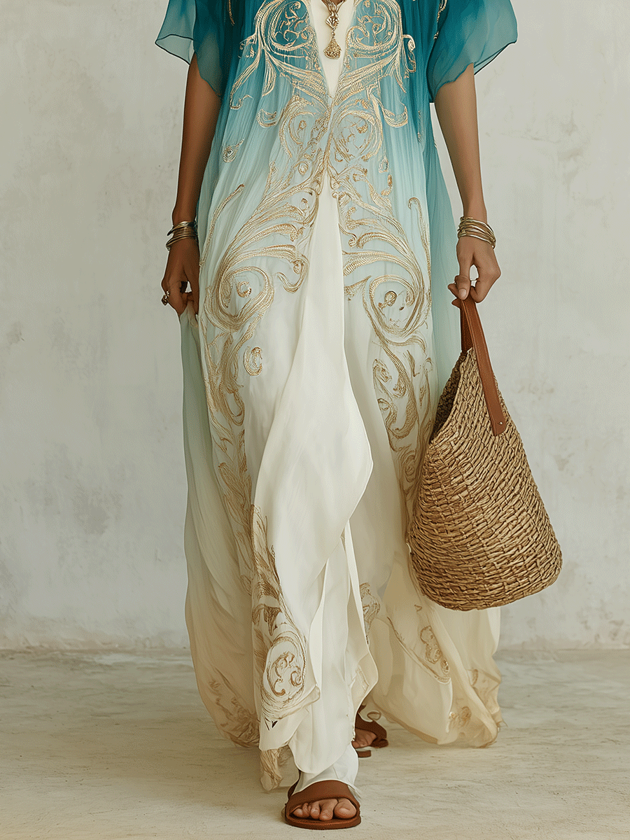 Lower-body view of aqua ombre kaftan maxi dress with gold embroidery and cream draped pants