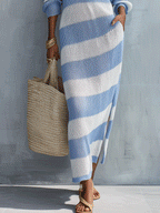 Blue and white striped knit maxi dress with side slit and side tie hem