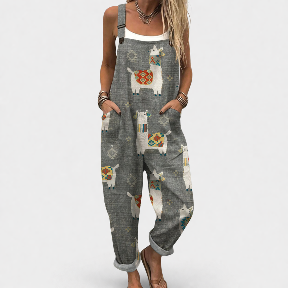 Gray printed overalls with colorful llama motif, adjustable shoulder straps and front pockets