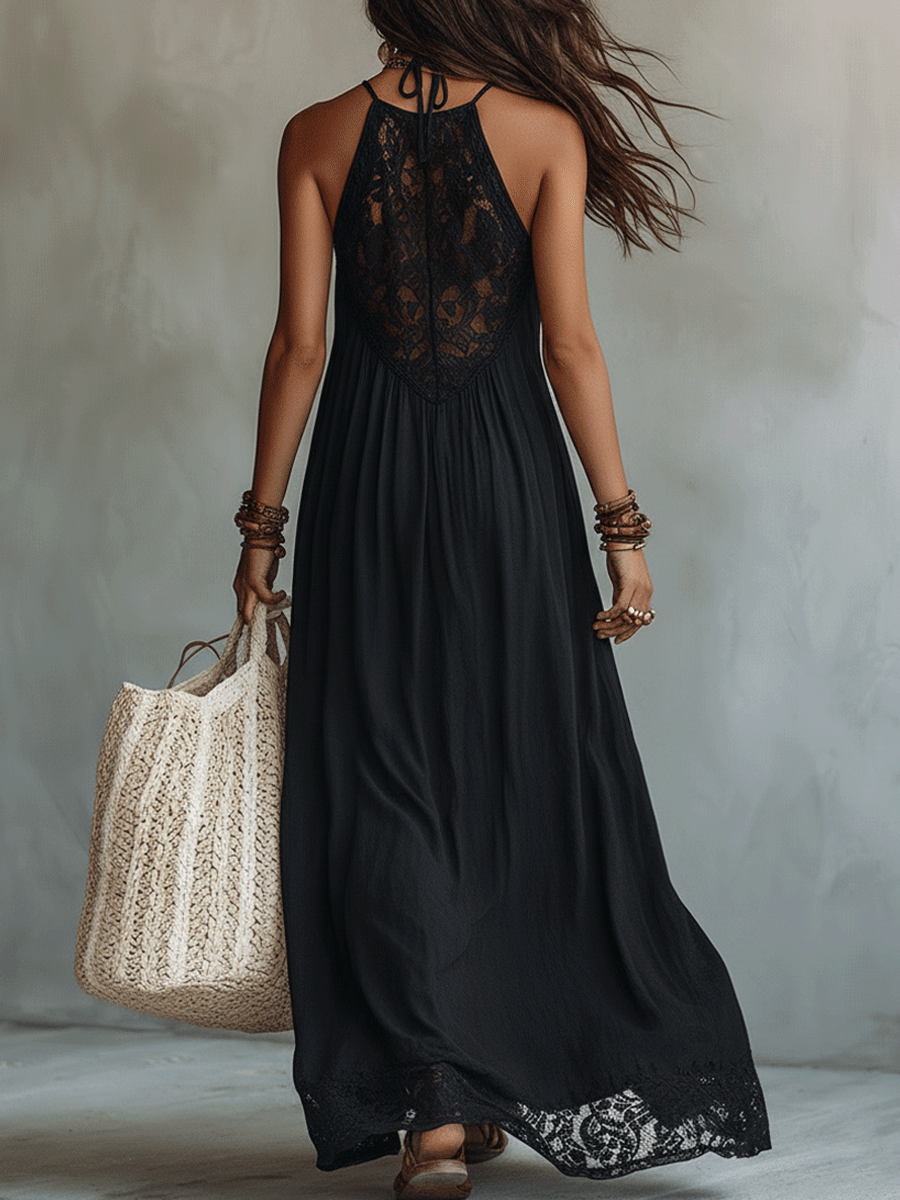 Black sleeveless maxi dress back view with lace neck detail and draped skirt