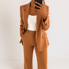 Brown tailored two-piece suit set with blazer and matching trousers, single-breasted blazer.