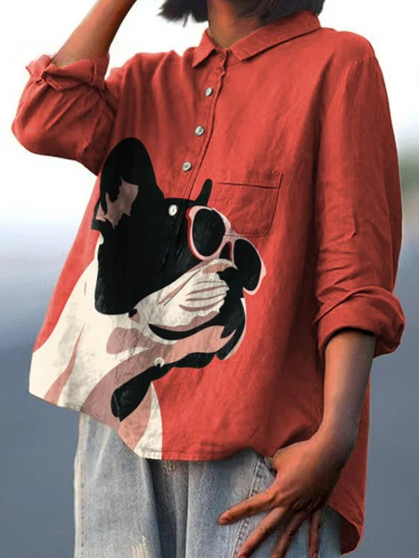 Red casual button-up shirt with French bulldog sunglasses graphic, side view on model