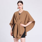 Camel-brown caped fleece shawl with V-neck and tied waist drape over outfit.