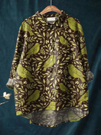 Women's button-up casual shirt with bird-and-floral print, long sleeves