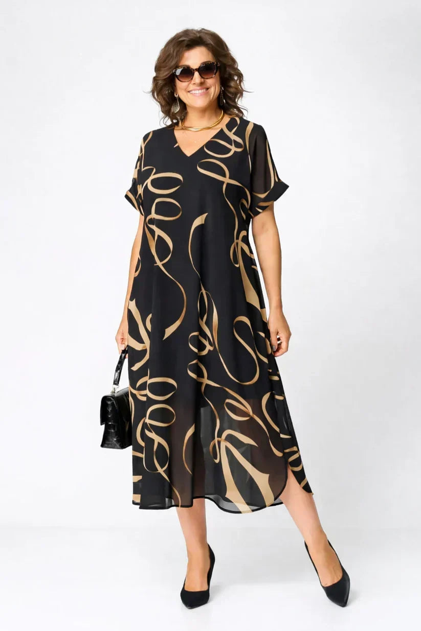 Women's black midi dress with gold swirl print, V-neck, short sleeves, draped hem