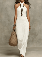 White relaxed linen halter maxi dress with draped cowl neckline and sleeveless column fit