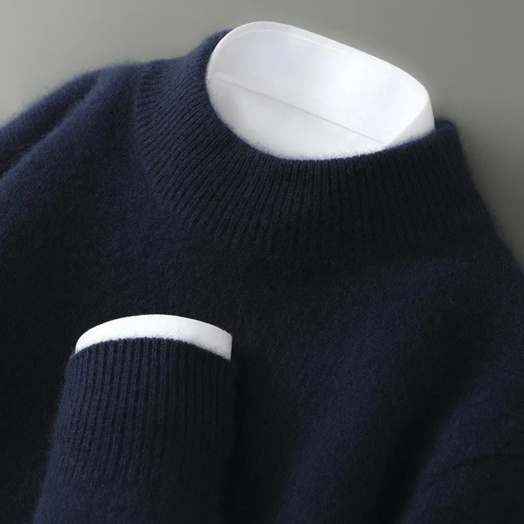 Navy cashmere mock-neck jumper with ribbed collar and long sleeves.