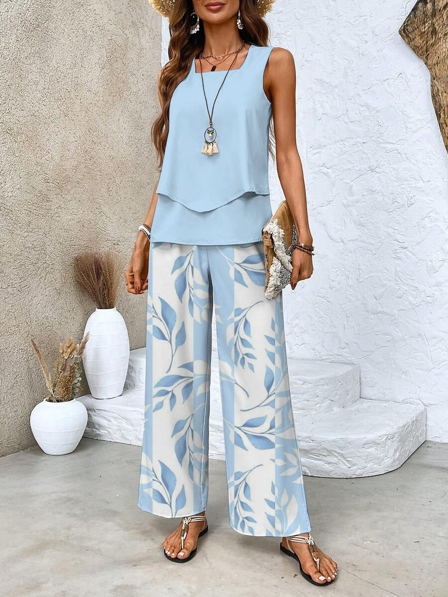 Light blue floral two-piece set with sleeveless layered top and wide-leg pants