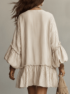 Off-white striped mini dress, back view, tiered ruffle hem and gathered sleeves