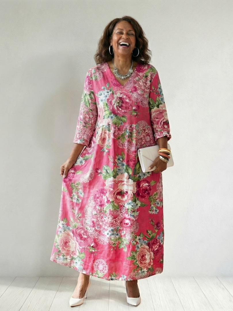 Pink floral midi dress with V-neck and three-quarter sleeves