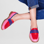 Pink loafer pair with red front accents and blue strap, tan sole